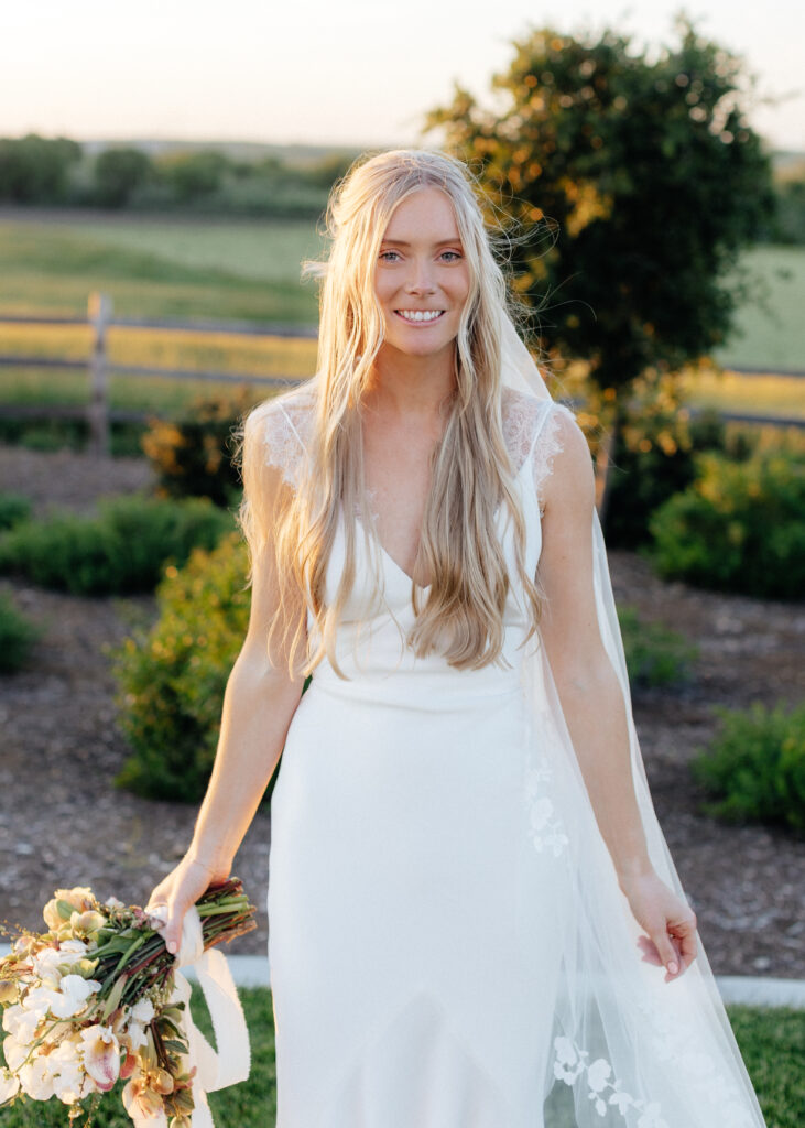 Bride with bouquet at Carter valley ranch wedding 