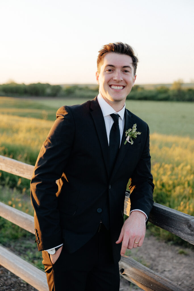 Groom smiling at Carter Valley Ranch 