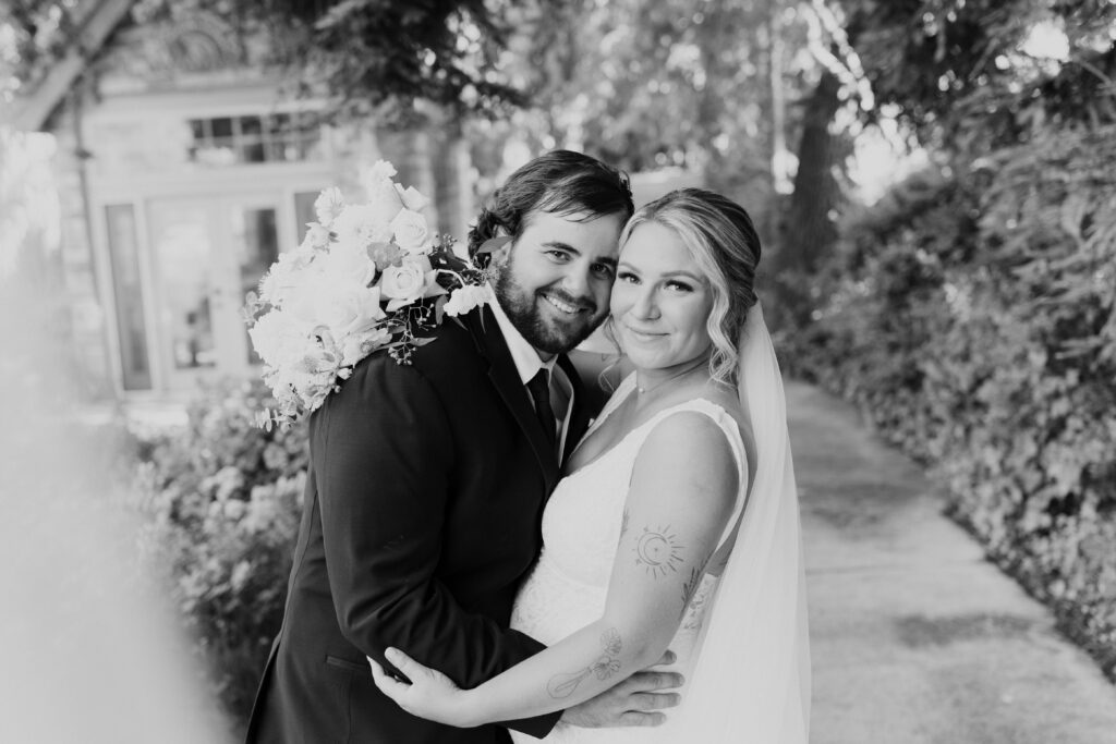 bride and groom in black and white 