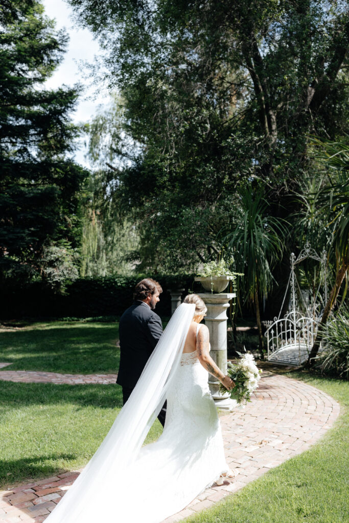 bride and groom in recessional at oakdale wedding venue