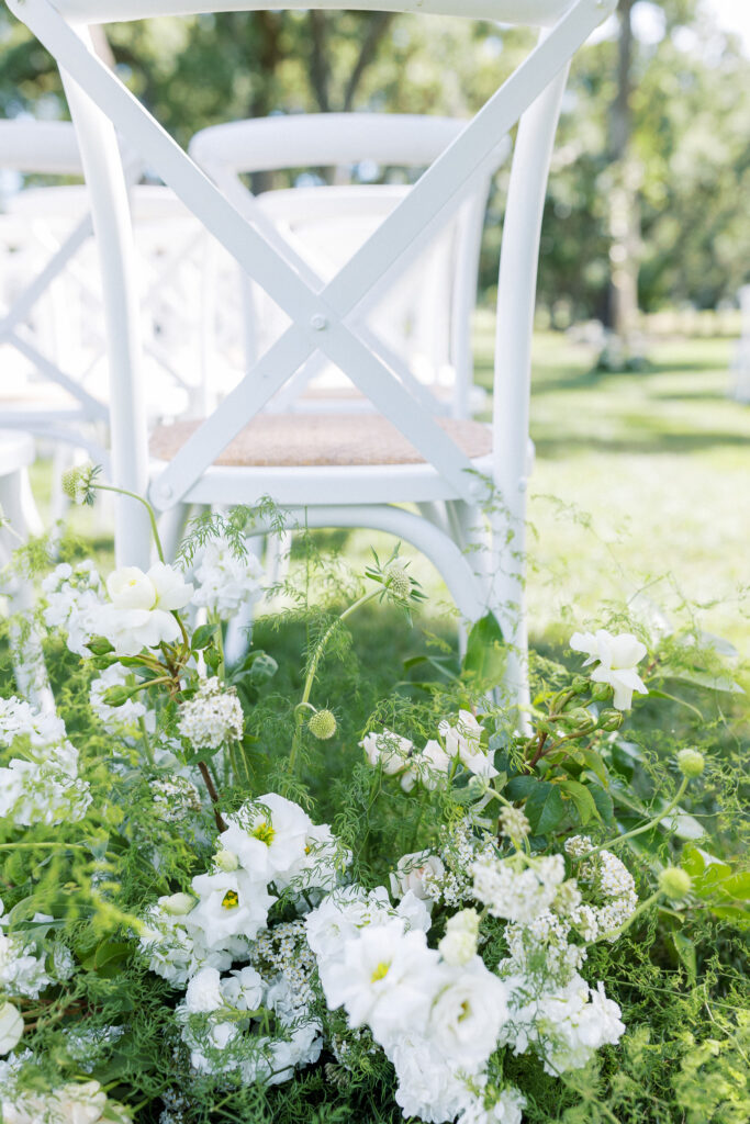 white ceremony chair with flowers at silverado resort