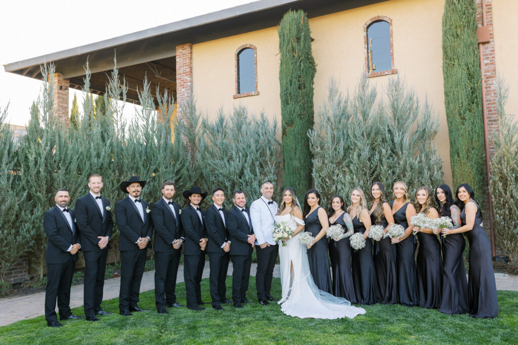 Bridal party in black dresses at the Palm
