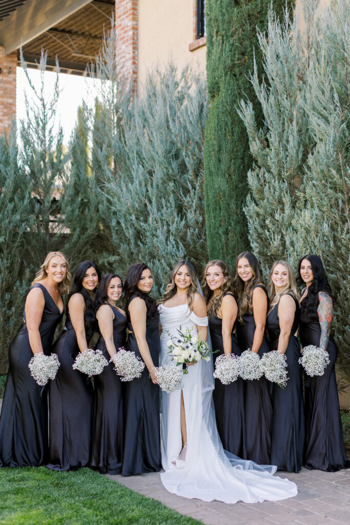 Bridal party in black dresses at the Palm
