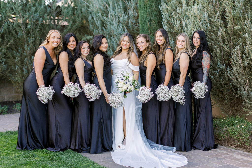 Bridal party in black dresses at the Palm