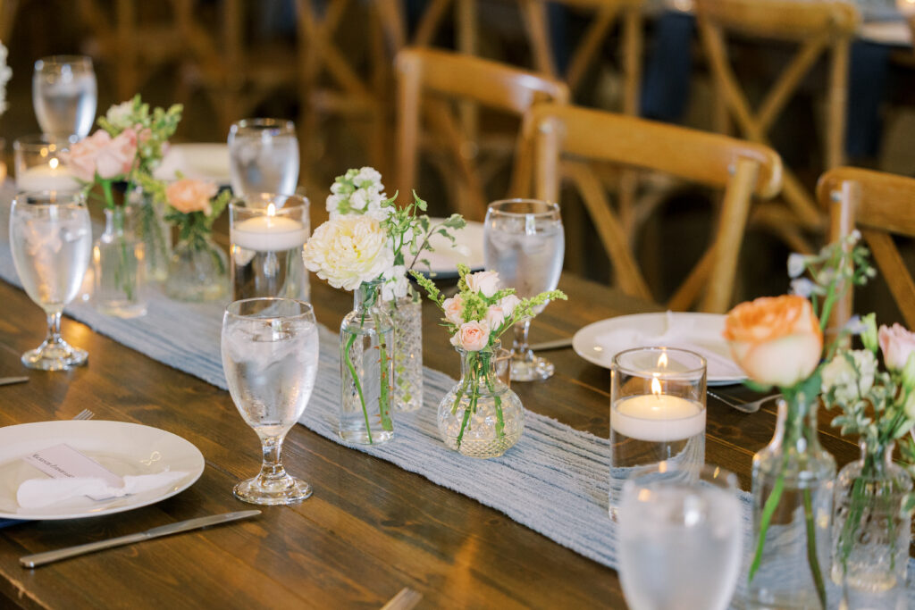 Elegant wedding reception setup in barn at La Reve in Elk Grove
