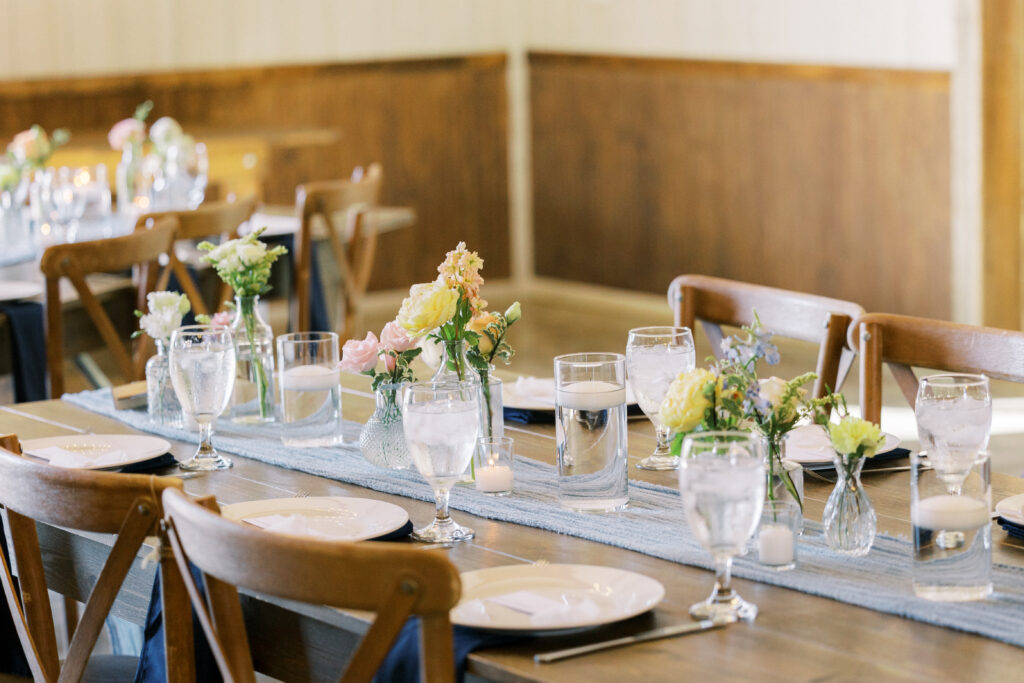 Elegant wedding reception setup in barn at La Reve in Elk Grove
