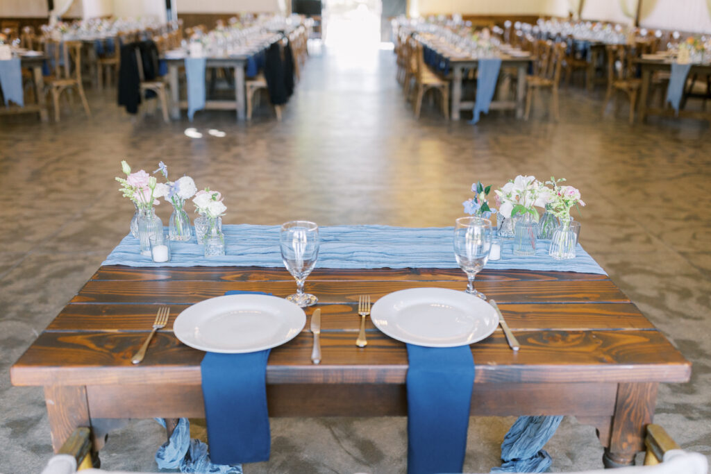 Elegant wedding reception setup in barn at La Reve in Elk Grove
