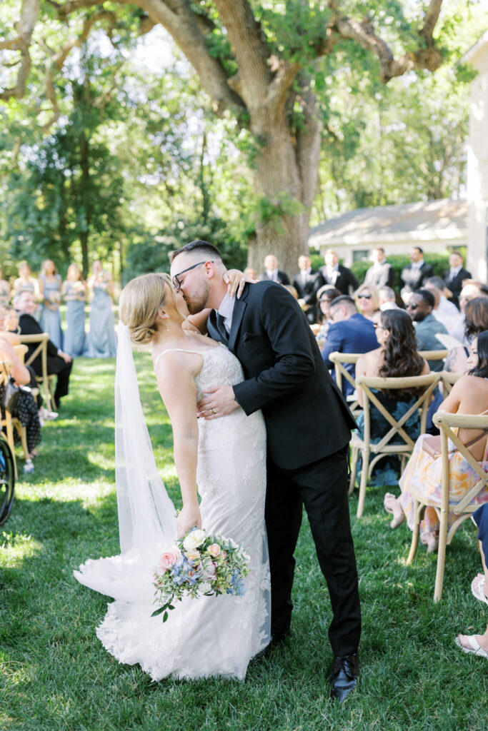Outdoor ceremony under trees at La Réve Estate and Vineyard


