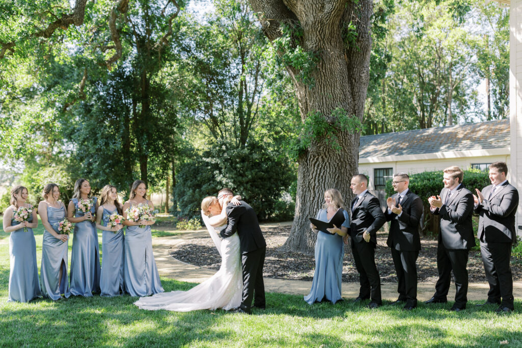 Outdoor ceremony under trees at La Réve Estate and Vineyard

