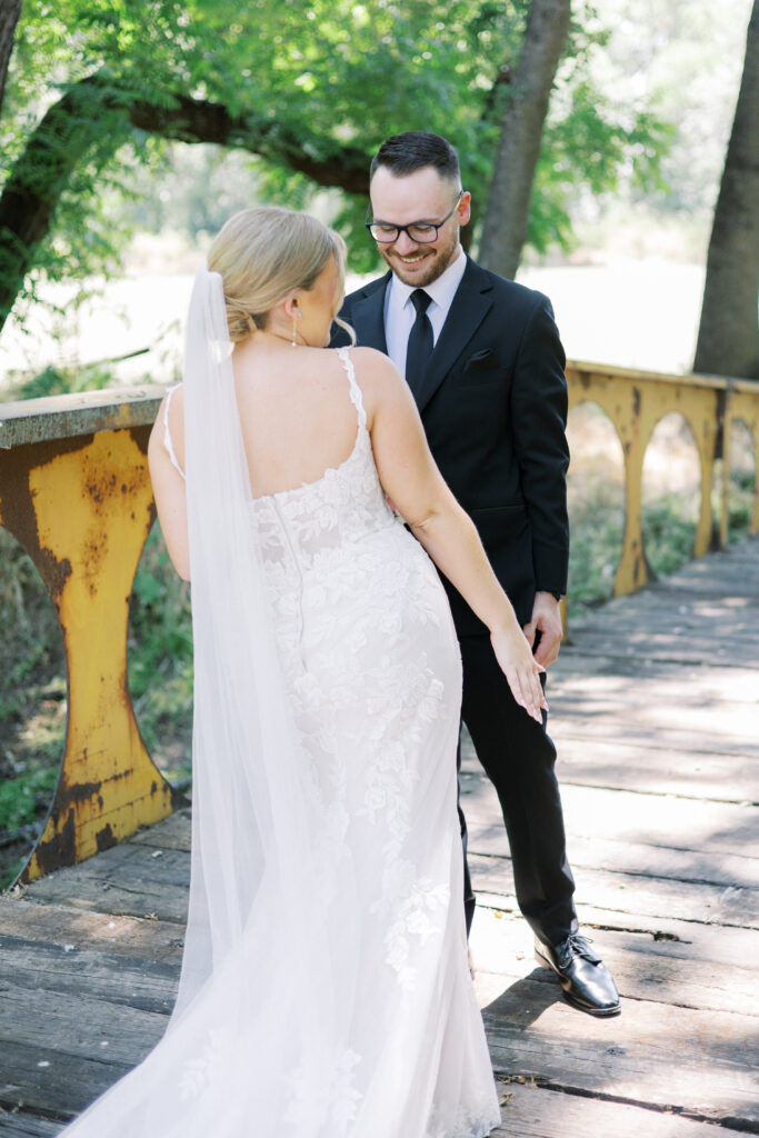 First look between bride and groom in vineyard at La Réve

