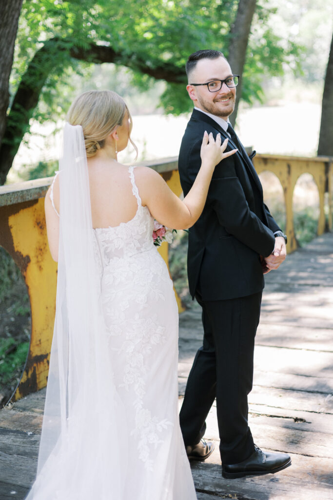 First look between bride and groom in vineyard at La Réve

