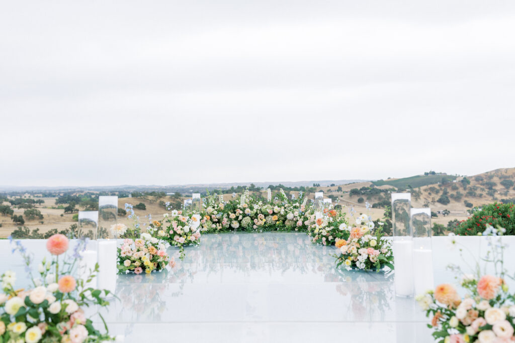 Ceremony Aisle over water | Outdoor ceremony at Eagle Oak Ranch with vineyard views in Paso Robles
