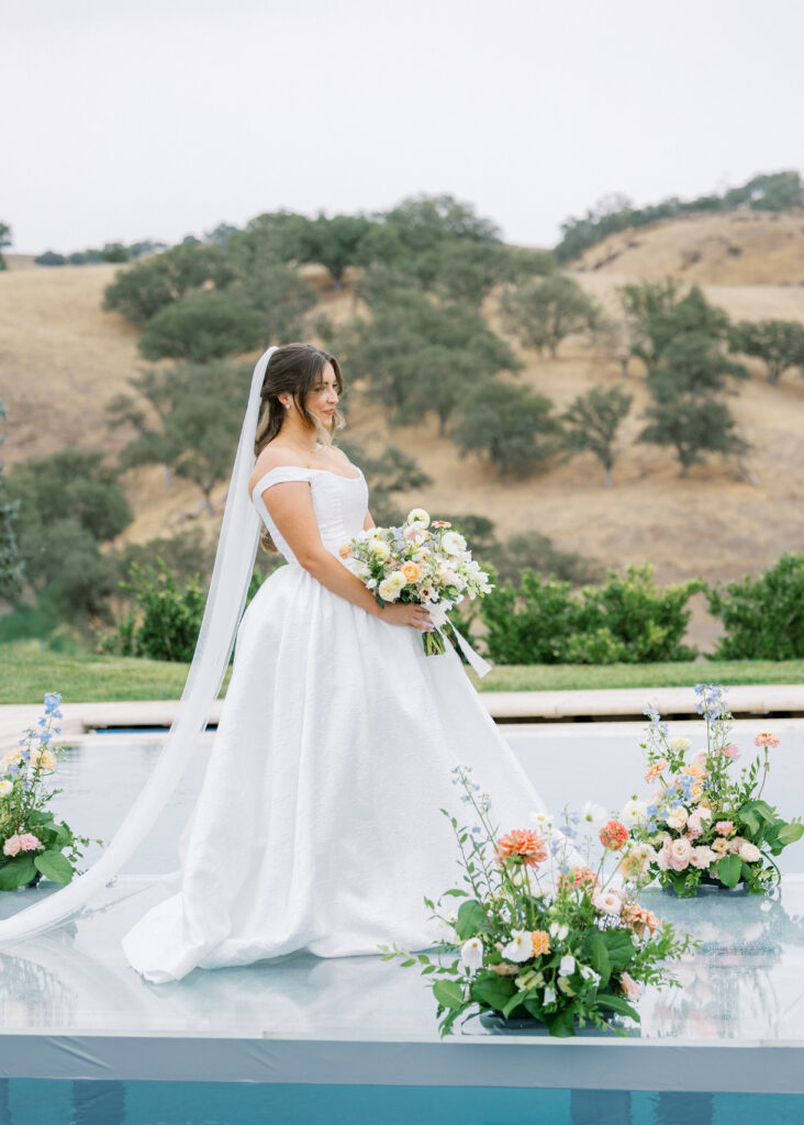Ceremony Aisle Over water with bride and groom