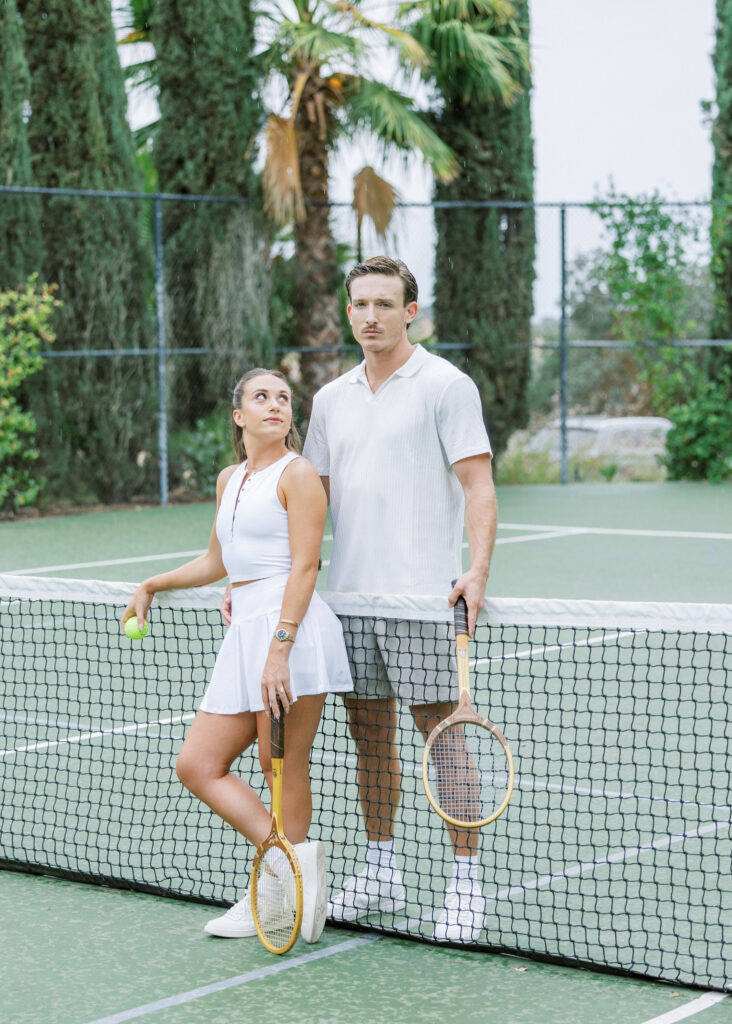 Paso Robles engagement session with couple playing tennis at Eagle Oak Ranch