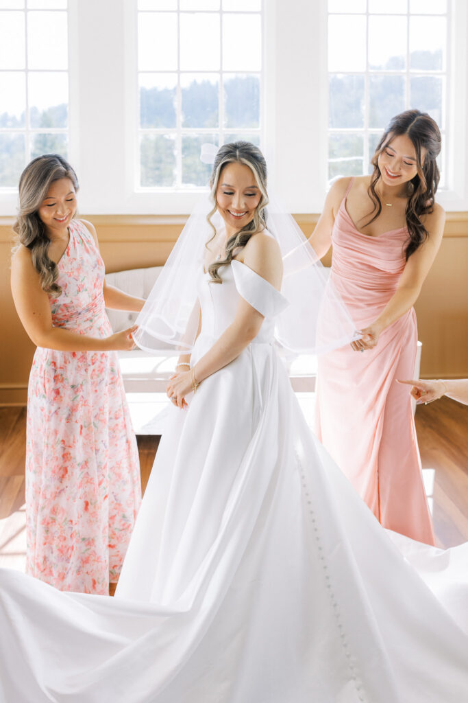 Bride in classic A-line gown with bow veil during first look captured by Marin wedding photographer Shannon bryn photo