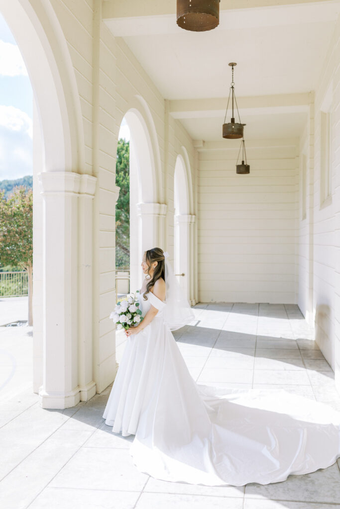Classic bridal portrait featuring A-line gown and bow veil by Marin wedding photographer Shannon Bryn Photo
