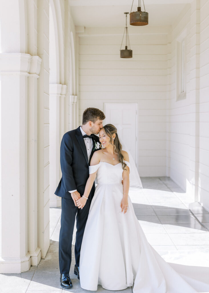 Classic bridal portrait featuring A-line gown and bow veil by Marin wedding photographer Shannon Bryn Photo
