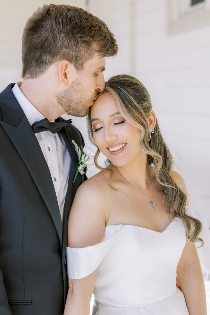 Classic bridal portrait featuring A-line gown and bow veil by Marin wedding photographer Shannon Bryn Photo
