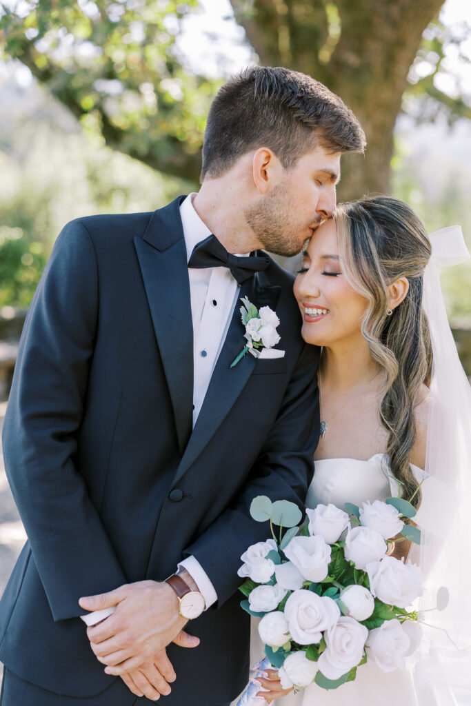 Classic bridal portrait featuring A-line gown and bow veil by Marin wedding photographer Shannon Bryn Photo
