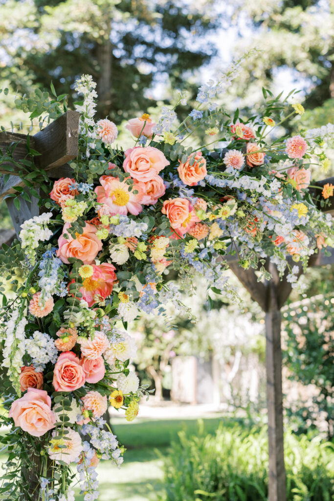 Romantic outdoor ceremony on the Tower Lawn at V. Sattui Winery, Napa Valley wedding photographer