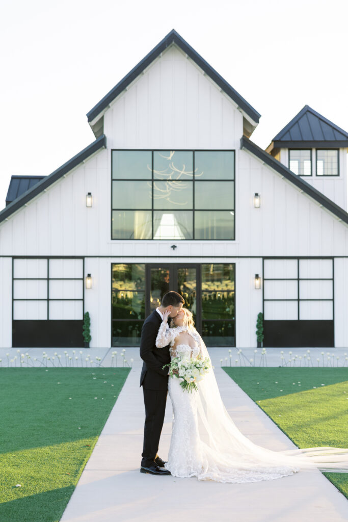 Romantic sunset portraits of the bride and groom on The Margaux’s open lawn, photographed by Fresno wedding photographer Shannon Bryn photo