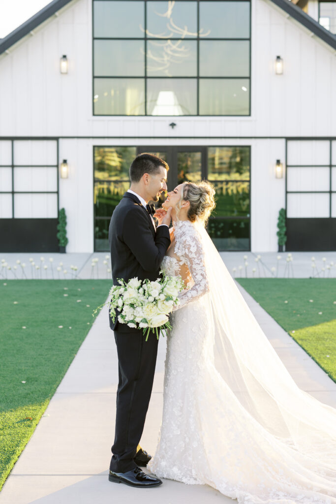 Romantic sunset portraits of the bride and groom on The Margaux’s open lawn, photographed by Fresno wedding photographer Shannon Bryn photo