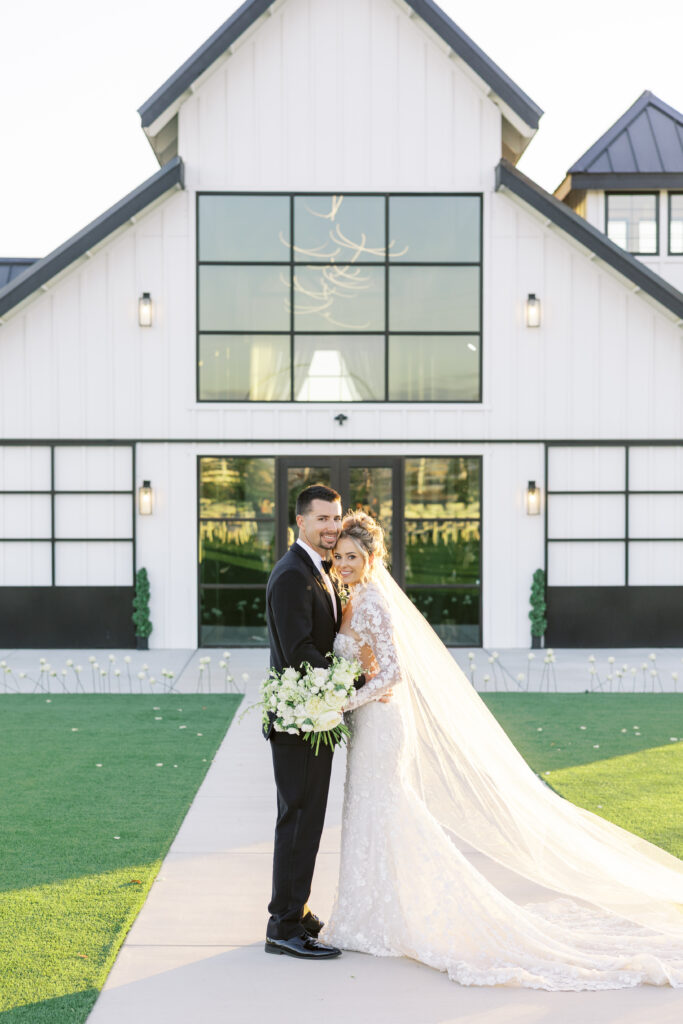 Romantic sunset portraits of the bride and groom on The Margaux’s open lawn, photographed by Fresno wedding photographer Shannon Bryn photo