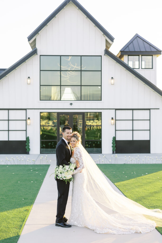 Romantic sunset portraits of the bride and groom on The Margaux’s open lawn, photographed by Fresno wedding photographer Shannon Bryn photo