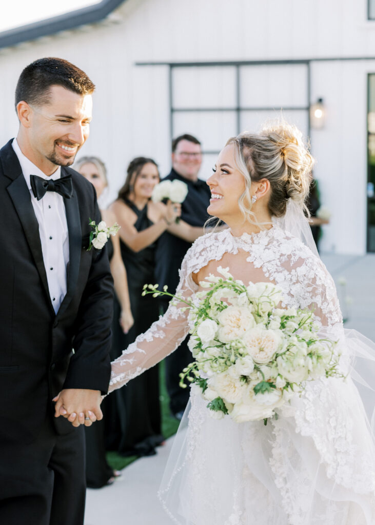 Romantic sunset portraits of the bride and groom on The Margaux’s open lawn, photographed by Fresno wedding photographer Shannon Bryn photo