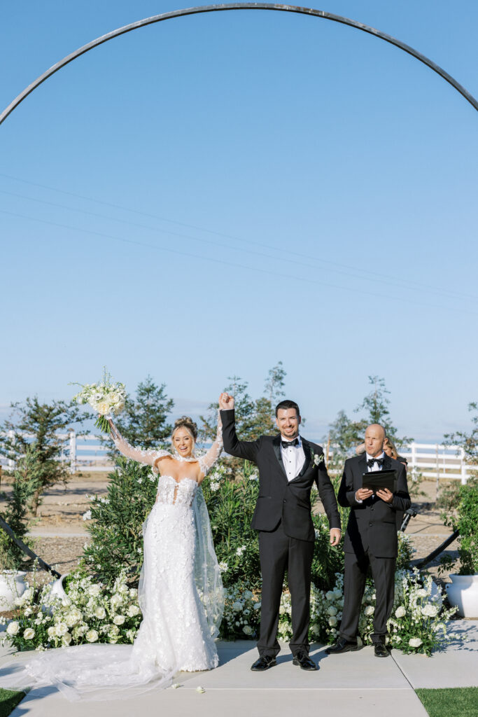 Bride and groom share a kiss during their luxury wedding at The Margaux in Madera, captured by Fresno wedding photographer Shannon Bryn Photo