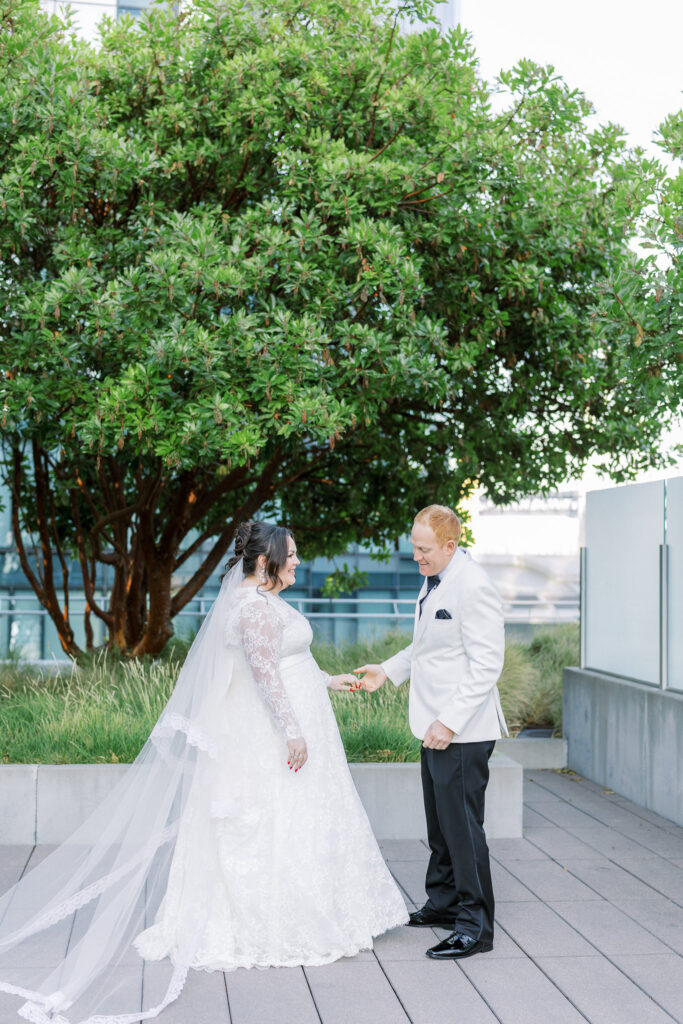 Couple sharing first-look moment captured by a luxury SF wedding photographer