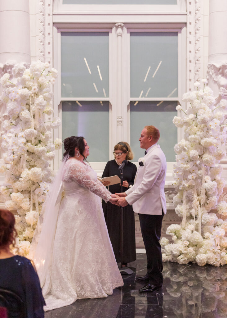 Guests seated for a Conservatory at One Sansome wedding ceremony in downtown SF