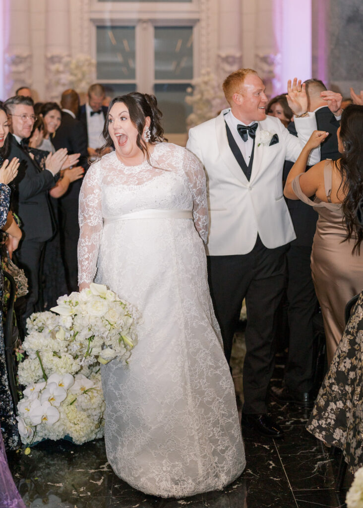 Guests seated for a Conservatory at One Sansome wedding ceremony in downtown SF