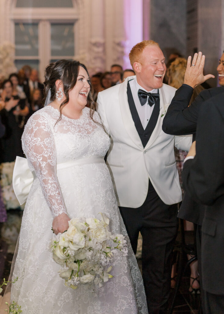 Guests seated for a Conservatory at One Sansome wedding ceremony in downtown SF
