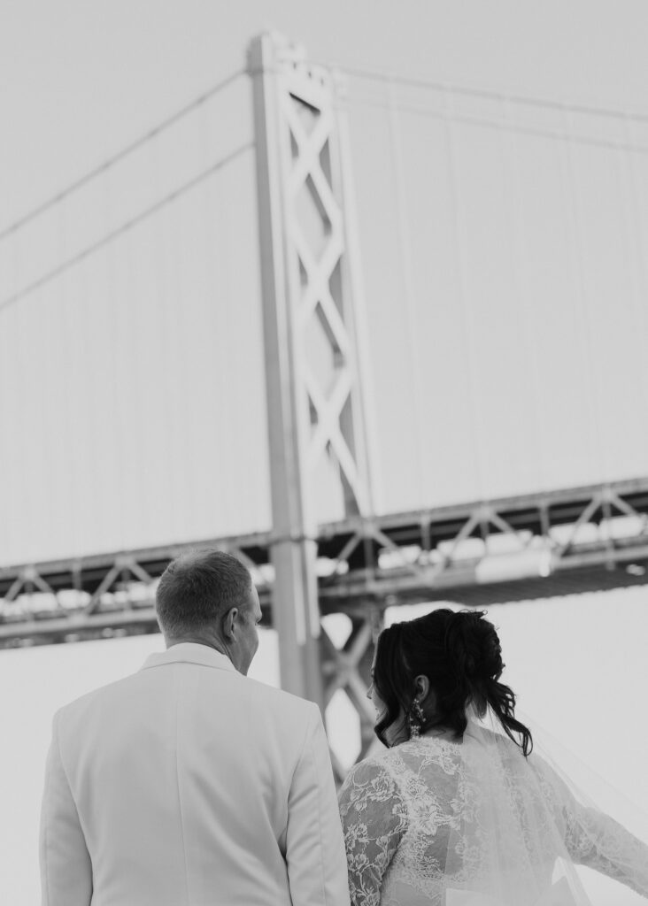 Couple sharing first-look moment captured by a luxury SF wedding photographer
