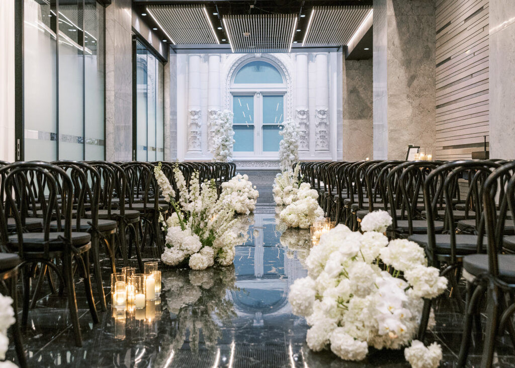 Guests seated for a Conservatory at One Sansome wedding ceremony in downtown SF