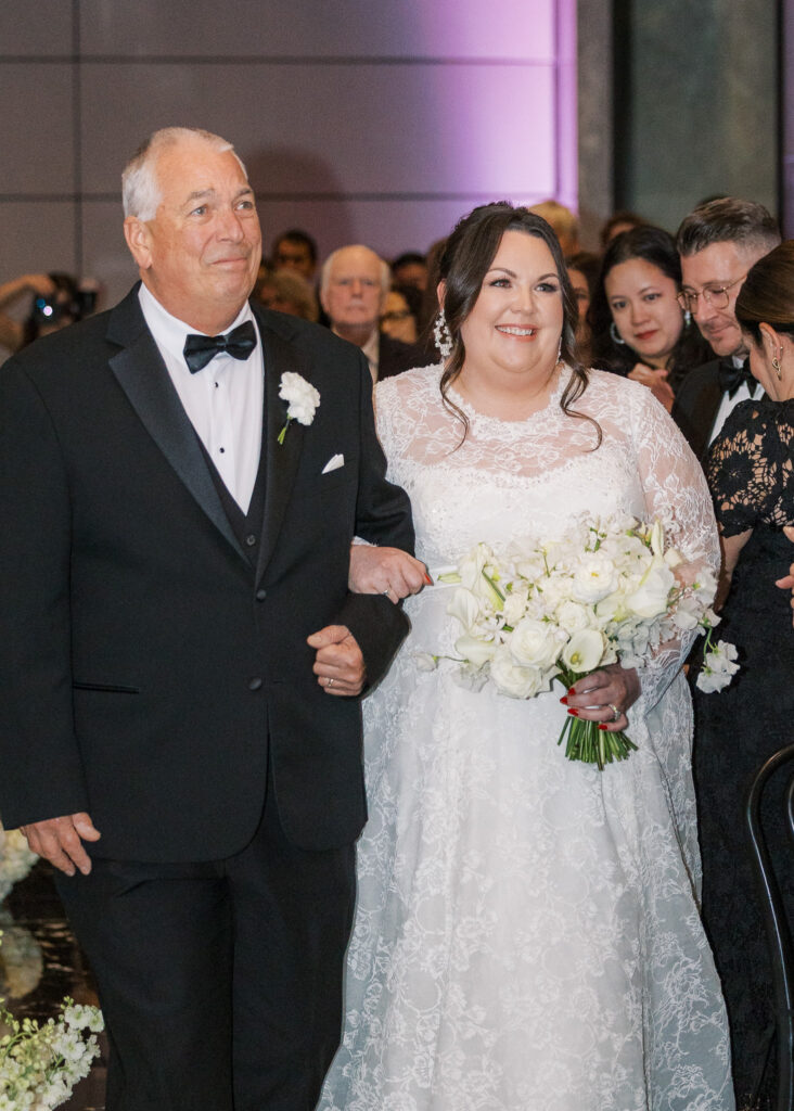 Guests seated for a Conservatory at One Sansome wedding ceremony in downtown SF