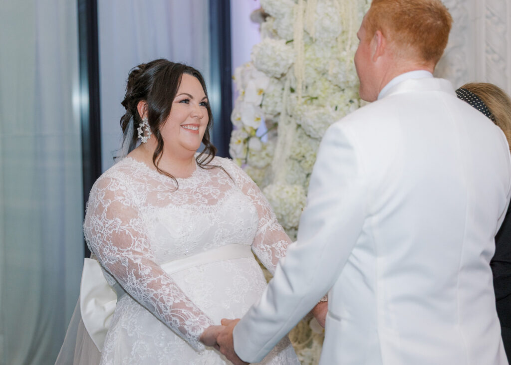 Guests seated for a Conservatory at One Sansome wedding ceremony in downtown SF
