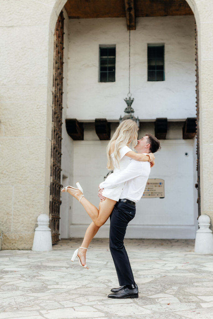Bride and groom portraits under the archways of the Santa Barbara Courthouse