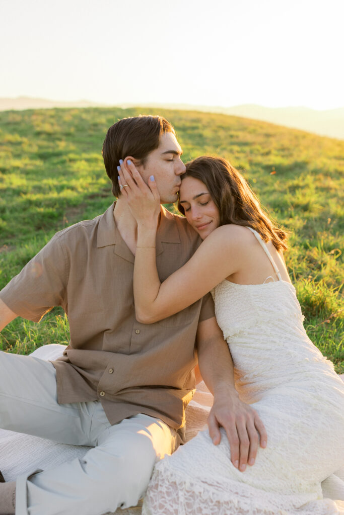 Romantic engagement portraits in the Livermore hills featuring soft light and natural movement