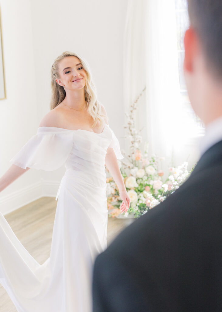 Bride and groom portraits with drapery modern wedding venue Magnolia Event Center