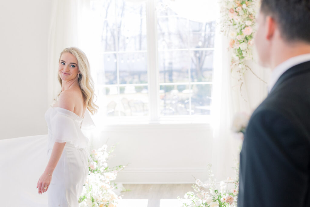 Bride and groom portraits with drapery modern wedding venue Magnolia Event Center