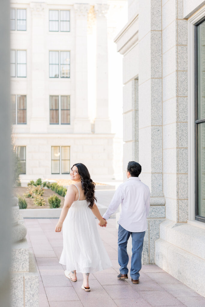 Salt Lake City engagement photos at Utah State Capitol columns