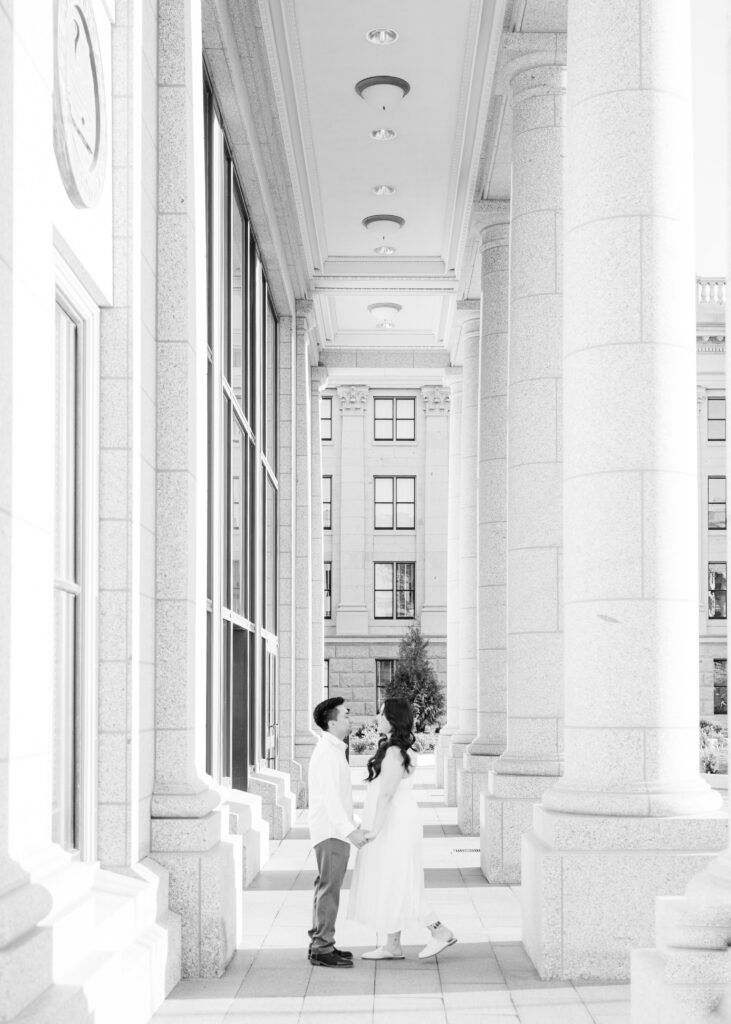 Salt Lake City engagement photos at Utah State Capitol columns