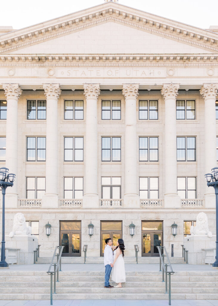 Salt Lake City engagement photos at Utah State Capitol columns