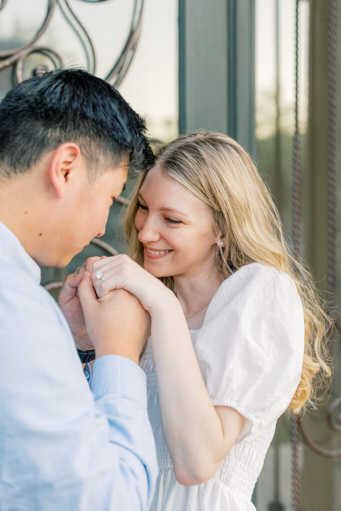 Refined and natural engagement photo of couple close together 