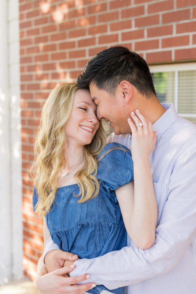 Couple embracing during natural engagement photos