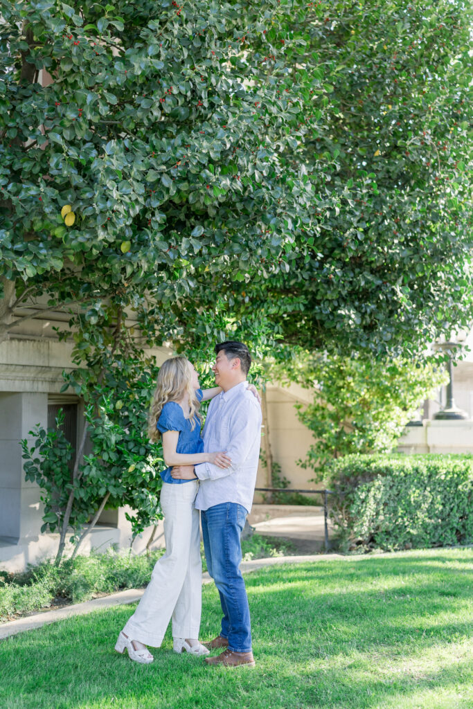 Timeless engagement photo showing couple laughing together